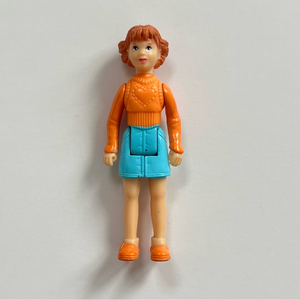 Vintage Fisher Price Sweet Streets girl figure orange shirt & blue skirt